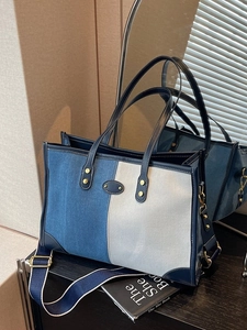 Large capacity colorblock denim tote bag with wide shoulder strap and leather trim details