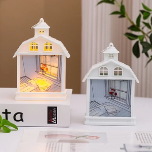 Detailed comparison of house-shaped LED night light in on and off modes with warm glow