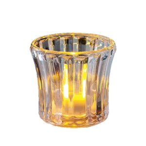 Vertical fluted glass crystal candle holder with warm LED light for cozy home decor