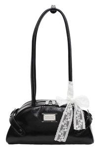 Black Boston shoulder bag in glossy leather with long handles and white lace bow detail