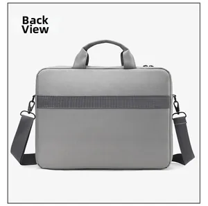 Vue arrière du sac d'ordinateur gris avec sangle pour bagage facilitant vos voyages