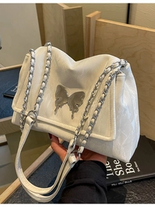 Off-white wrinkled tote bag with silver metal butterfly and chain shoulder strap