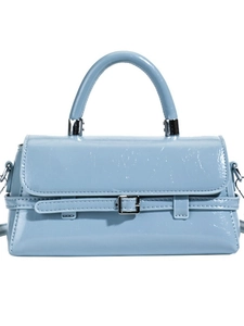 Modern sky blue patent leather handbag with silver buckle and round top handle
