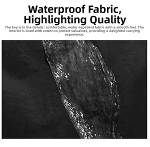 Waterproof black fabric detail of the backpack with padded interior for protection