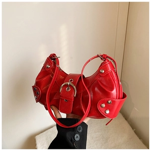 Red shiny patent leather shoulder bag with metallic buckles and rivets for women