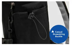 Detail of outdoor backpack featuring elastic drawstring buckle and durable metal zipper