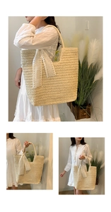 Detailed close-up of woven tote bag featuring vintage lace bow and straw texture