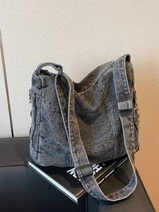 Vintage acid-wash grey denim crossbody bag with white stitching and large capacity