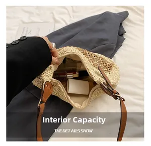 Internal capacity of the straw woven bag showing skincare items and smooth zipper closure