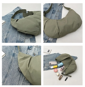 Detail of avocado green dumpling bag showing large capacity for essentials and logo label