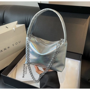 Silver laser metallic bucket bag with chain strap and pleat texture in a gift box