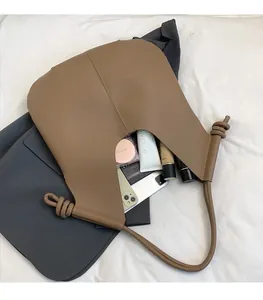 Internal view of large capacity tote bag showing space for phone and cosmetics