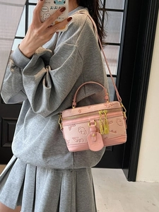 Pink mini box crossbody bag with cute 3D bear embossments and gold zipper details