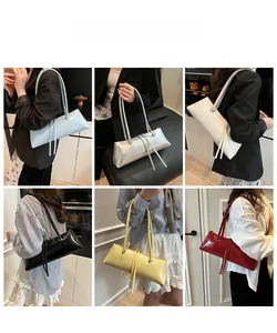 Six colors of glossy faux leather baguette bags shown on model in a collage view