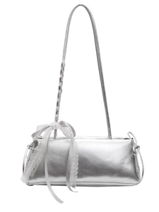 Silver metallic baguette shoulder bag with white lace bow detail and Y2K aesthetic