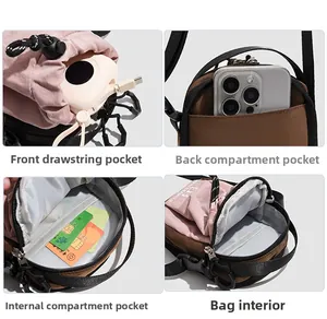 Detailweergave van crossbodytas met trekkoordsluiting en duurzame nylon textuur