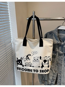 Sac fourre-tout minimaliste en toile blanche avec imprimés d'animaux et anses noires