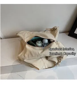 Top view of the spacious interior of the beige canvas bag showing daily essentials