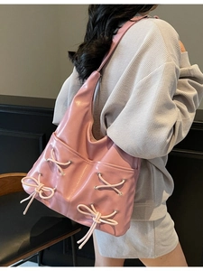 Pink large capacity hobo bag with ribbon bows and stylish cross-lace design for women