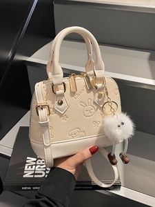 Chic beige shell handbag with cute embossed rabbit and detachable shoulder strap