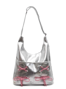 Silver metallic Hobo bag with pink bow ribbon lace-up detail and adjustable strap