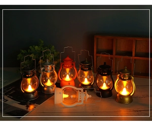 Close-up of retro LED lanterns in multiple colors showing warm flame lighting effects