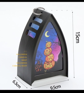 Macro view of Halloween lantern showing pumpkin illustrations and dimensions of 15x9.5cm