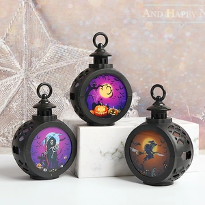 Three Halloween LED lanterns featuring pumpkin, reaper, and witch silhouettes on white background