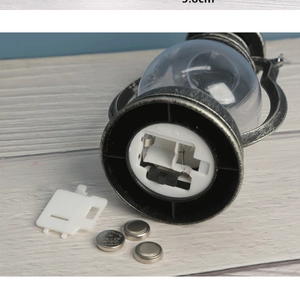 Detail view of the vintage decorative lantern base with AG10 button batteries and 5.8cm size