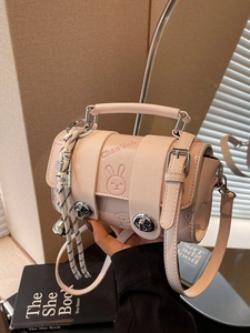 Pink cartoon bunny and bear embossed leather mini pillow bag with top handle and strap