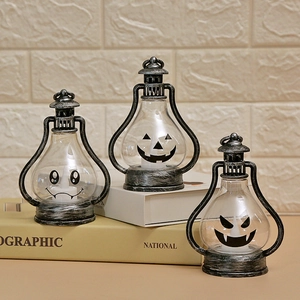 Retro Halloween LED lanterns with pumpkin, ghost, and bat patterns in vintage silver finish