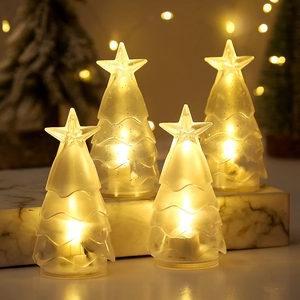4er-Set LED-Weihnachtsbaum-Kerzen mit Sternenaufsatz und warmem Licht auf Marmorsockel