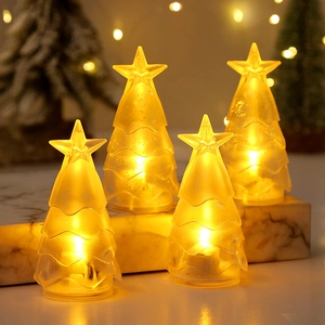Vier bernsteinfarbene LED-Weihnachtsbaumkerzen mit warm leuchtender Sternspitze