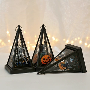 Detailed view of Halloween pyramid lanterns with witch, skull, and pumpkin patterns