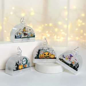 Set of four Halloween LED lanterns with pumpkin and witch motifs on white stands