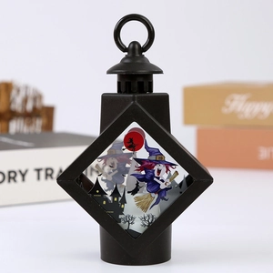 Macro detail of Halloween lantern showing witch, castle, and bat illustration inserts