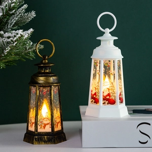 Detail of vintage Christmas lanterns with LED candles and festive glass illustrations