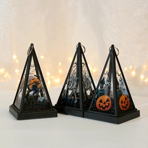 Set of three Halloween lanterns featuring witch, skeleton, and pumpkin themed designs