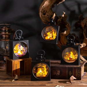Halloween decorative lantern set with glowing pumpkin, witch and castle silhouettes