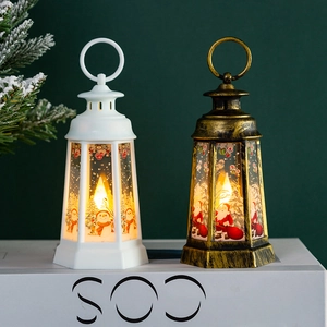 Detail of Christmas lantern with festive Santa print and warm LED candle light inside