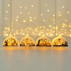 Set of four Halloween LED lanterns with silhouettes of pumpkin, witch and skull