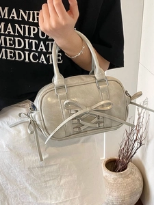 Sac Boston nacré avec nœud papillon et brides croisées pour femmes élégant