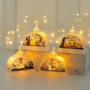 Set of four glowing Halloween LED lanterns with pumpkin, witch, and reaper motifs