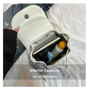 Interior view of embroidered drawstring backpack showing spacious storage capacity