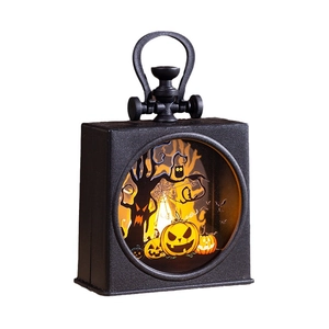 Halloween decorative lantern with pumpkin scene and warm LED light in black vintage frame