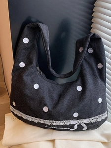 Sac hobo en toile gris foncé à pois blancs avec bordure en dentelle et nœud brodé
