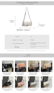 Detail view of small square oil wax leather bag with size labels and metal hardware