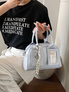 Chic light blue patent leather pillow bag with stylish knot charm for women's summer fashion