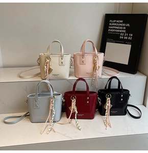 Detailed collection of mini bucket bags in five colors with textured synthetic leather finish