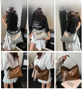 Detailed views of women's large shoulder bag with heart charm and woven tassel details